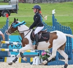 8 year-old Scarlett McDonald celebrates her success in the Club 60 & 70cm Championships 8 year-old Scarlett McDonald celebrates her success in the Club 60 & 70cm Championships